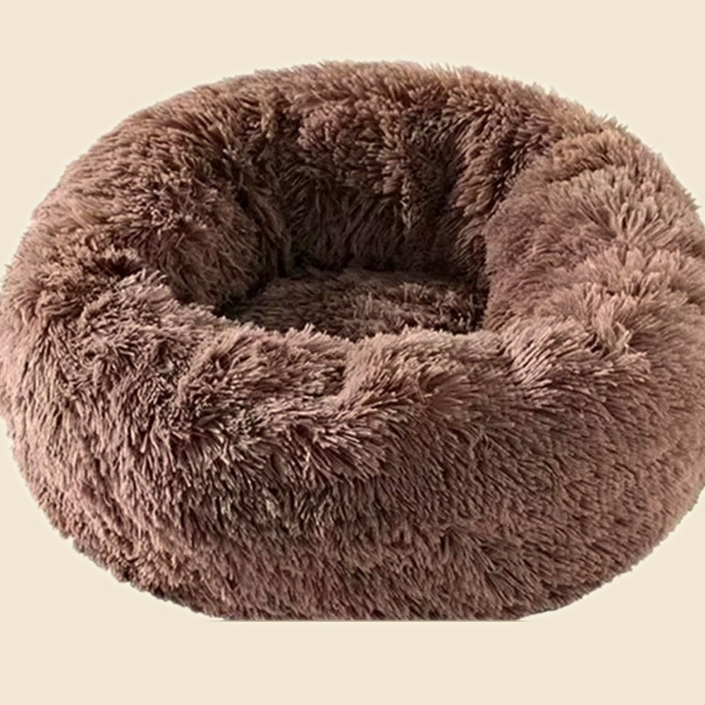 Denwell plush donut pet bed in sand, on cream background
