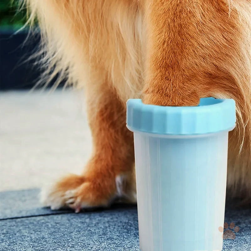 Golden Retriever having a paw cleaned with the Denwell Paw Cleaner Cup