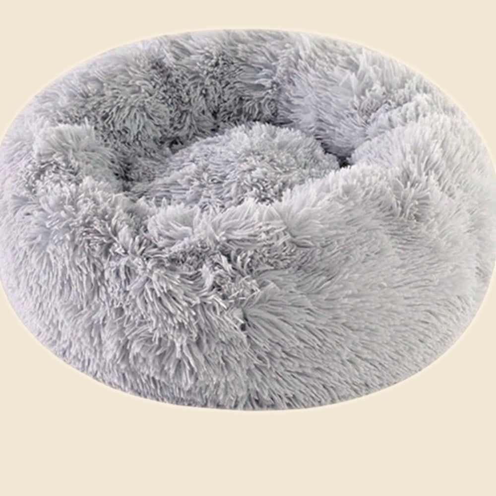 Denwell plush donut pet bed in gray, on cream background