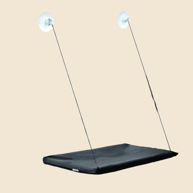 Denwell hanging cat hammock in Black, on cream background