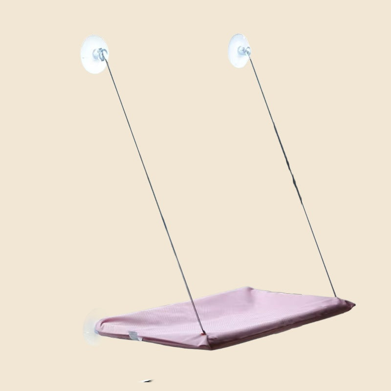 Denwell hanging cat hammock in Pink, on cream background
